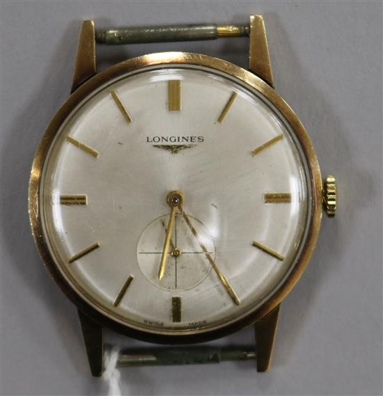 A gentlemans 1960s 9ct gold Longines manual wind wrist watch, (no strap).